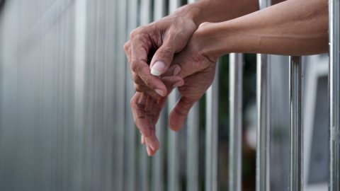 Woman in prison cell