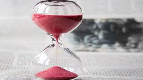 Hourglass with pink sand