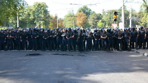 Police officers in a line on a street