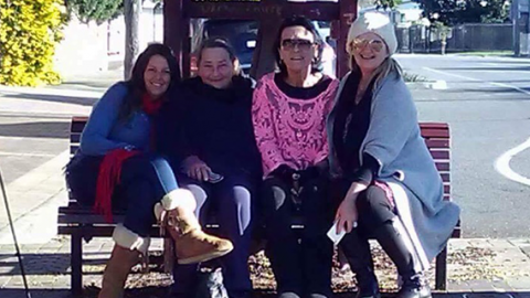 Grandmothers sitting on bench