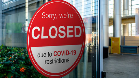 Closed COVID sign