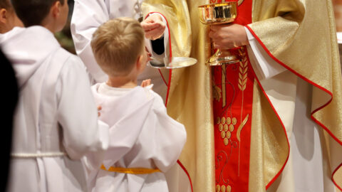 Priest and child