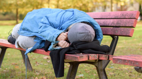 Homeless woman on bench