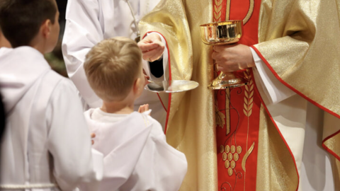 Priest and children