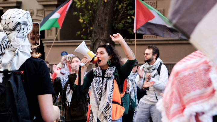 Syrian Palestinian woman Nat Farah addresses a rally