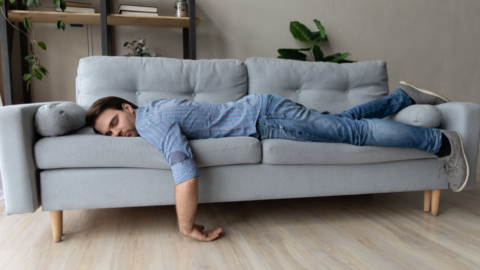 Man asleep on couch