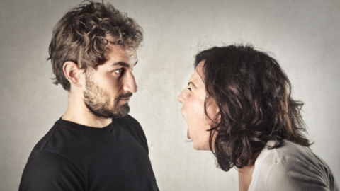 Woman shouting at a man